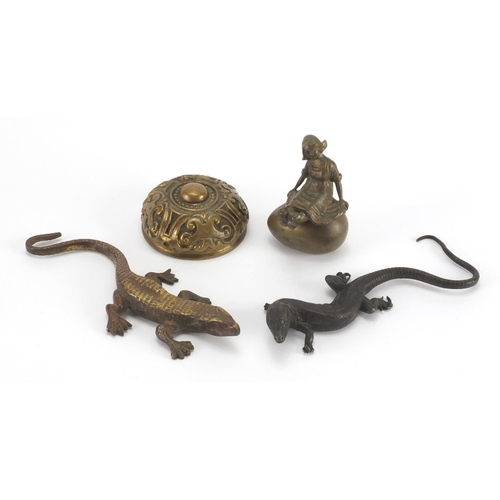 100 - Early 20th century Austrian Patinated bronze lizard, together with two brass paperweights and a bras... 