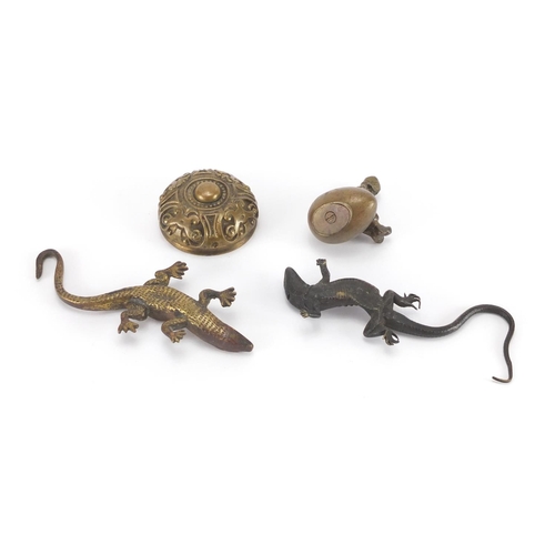 100 - Early 20th century Austrian Patinated bronze lizard, together with two brass paperweights and a bras... 