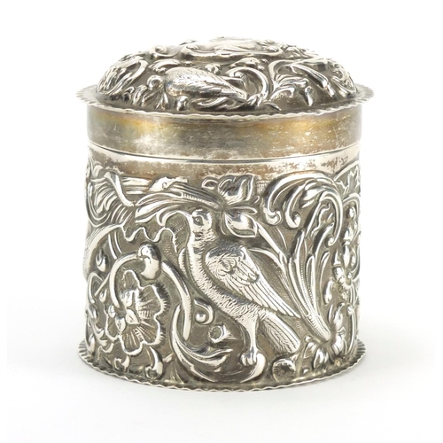 190 - Victorian silver cylindrical box and cover, embossed with birds amongst flowers, by Goldsmith's & Si... 
