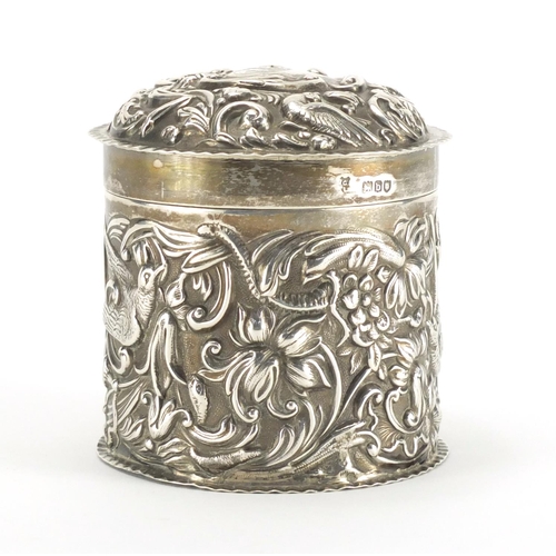 190 - Victorian silver cylindrical box and cover, embossed with birds amongst flowers, by Goldsmith's & Si... 