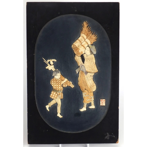 737 - Pair of Japanese lacquered panels, each decorated with two figures, inlaid with ivory, bone and Moth... 