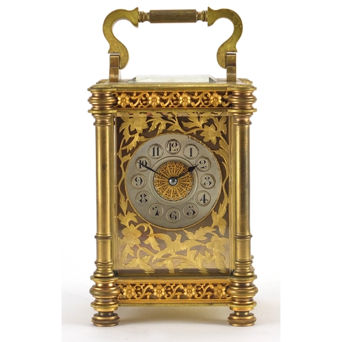1270 - French brass cased carriage clock striking on a gong, with architectural columns and gilt blind fret... 