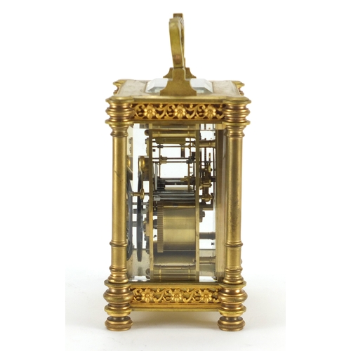 1270 - French brass cased carriage clock striking on a gong, with architectural columns and gilt blind fret... 