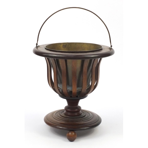 2133 - Regency style inlaid mahogany three footed planter with brass liner and swing handle, 40.5cm high