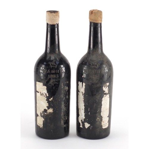 2220 - Two bottles of Warres vintage 1963 port