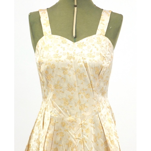 2256 - 1930's dress embroidered with gold roses, 120cm in length