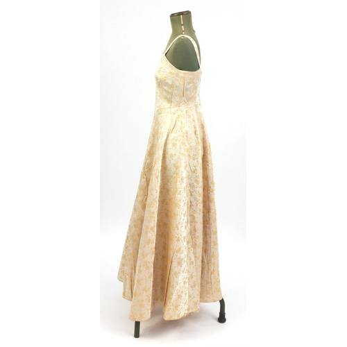 2256 - 1930's dress embroidered with gold roses, 120cm in length