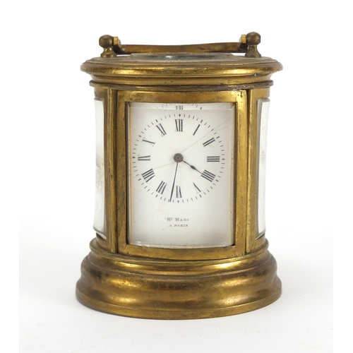 1275 - 19th century miniature French brass oval brass cased carriage clock, by Henry Marc of Paris with bev... 