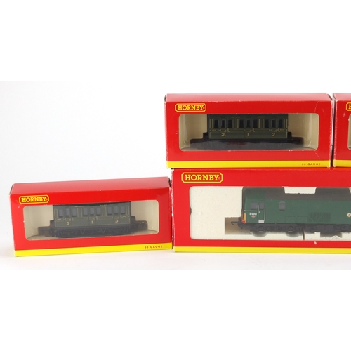 519A - Four Hornby OO gauge coaches and a diesel locomotive E6001, with boxes