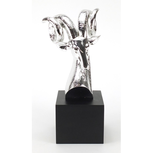 2270 - Silvered bust of an antelope, raised on a black block base, 39.5cm high