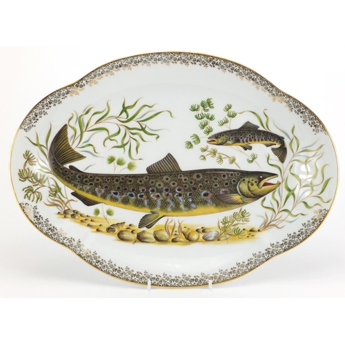 2273 - Limoge platter decorated with two fish amongst reeds, 42cm wide