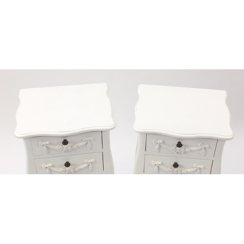 2100 - Pair of white painted night stands, each fitted with two drawers and with swag decoration, 75cm H x ... 