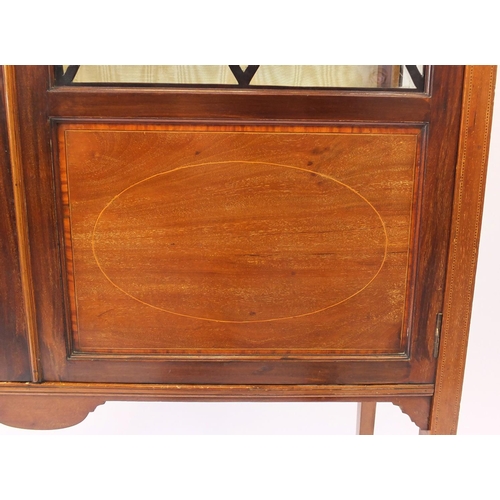 2135 - Edwardian inlaid mahogany china cabinet, fitted with a pair of lozenge glazed doors enclosing two sh... 