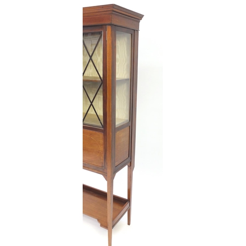 2135 - Edwardian inlaid mahogany china cabinet, fitted with a pair of lozenge glazed doors enclosing two sh... 