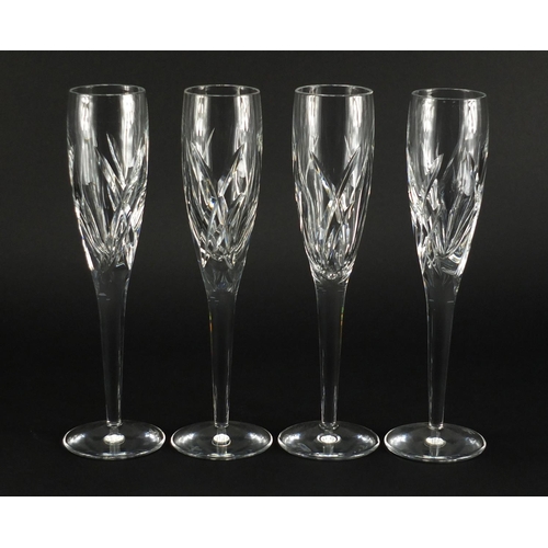 2174 - Four Waterford Crystal champagne flutes by John Rocha, boxed, 26cm high