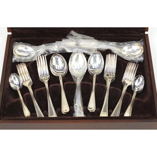 2264 - Cooper Ludlam mahogany six place canteen of Sheffield silver plated cutlery, 39cm wide