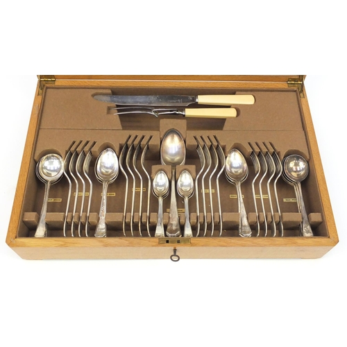 2108 - Atkin Brothers oak eight place canteen of Sheffield silver plated cutlery, 54cm wide