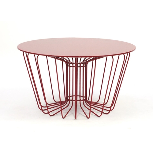 2014 - Zanotta Wire table designed by Levy Arik, with circular glass top in red, plaque to the underside, 3... 
