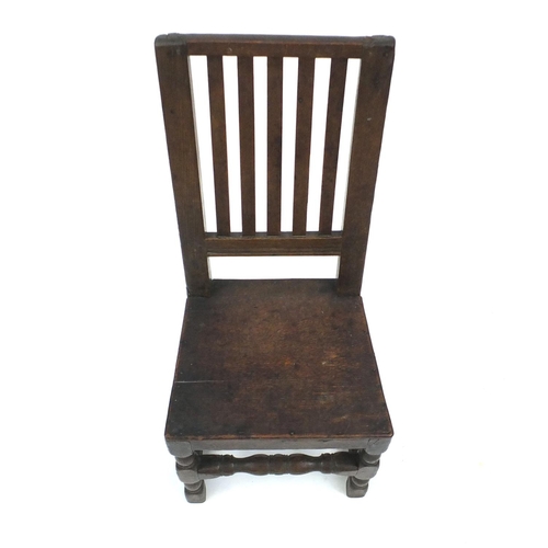 2130 - 18th century oak slate back chair, 96cm high