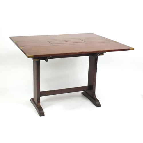 2077 - Mahogany campaign style drop leaf table, with brass fittings, 71cm H x 107cm W x 31cm D (extending t... 