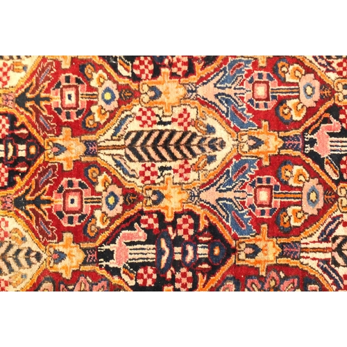 2010 - Rectangular Persian Baktiari rug, the central field having all over diamond medallions enclosing flo... 