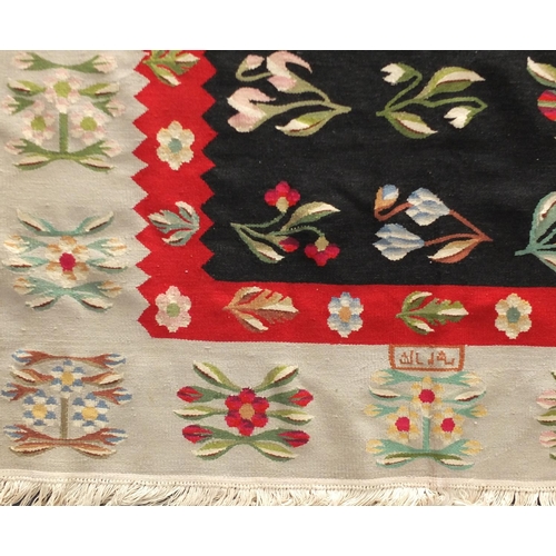 2090 - Rectangular Bessarabian Kilim rug, having an all over stylised floral design, approximately 180cm x ... 