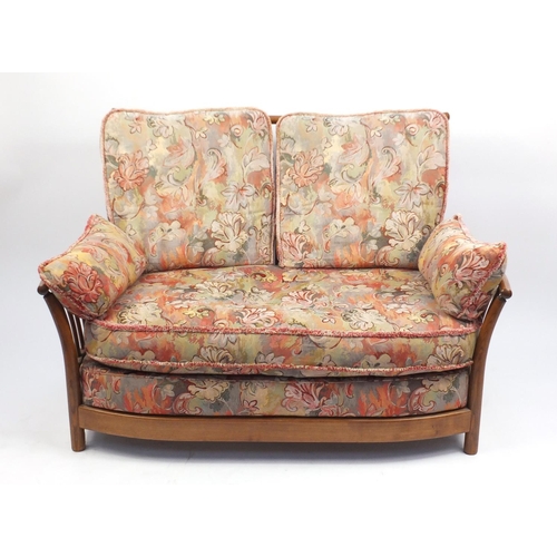 2075 - Ercol Renaissance two seater settee, with floral upholstered lift off cushions, approximately 140cm ... 