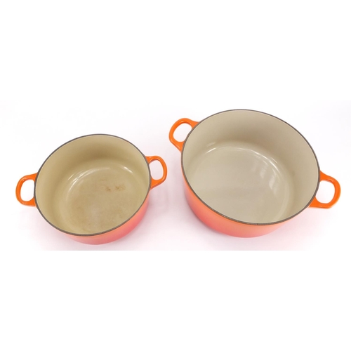 2228 - Two Le Creuset lidded casserole dishes, the largest 31cm wide