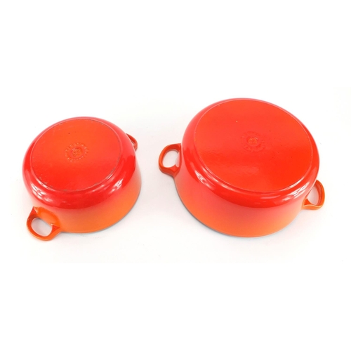 2228 - Two Le Creuset lidded casserole dishes, the largest 31cm wide