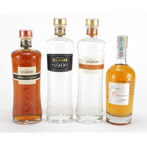 2325 - Four bottles of Grappa, three Segnana and one Nanmoni