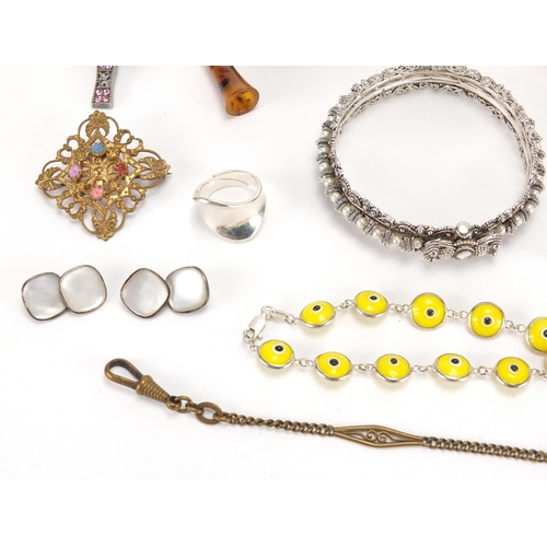 2827 - Costume jewellery including a carnelian necklace, brooches, silver rings and a rectangular silver ci... 