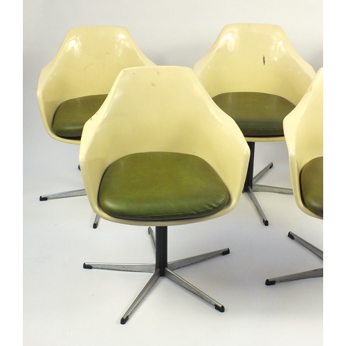 2134 - Set of five 1970's Arkana salon chairs, with lift off leather cushions, each 83cm high