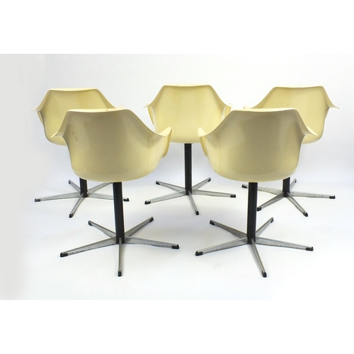 2134 - Set of five 1970's Arkana salon chairs, with lift off leather cushions, each 83cm high