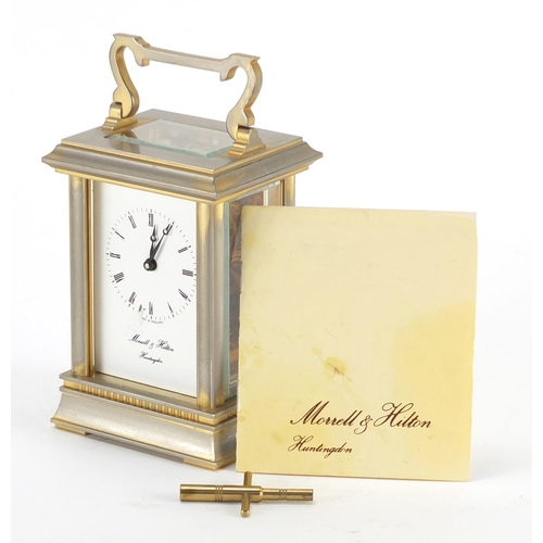 2357 - Morrell & Hilton brass cased carriage clock with enamelled dial and Roman numerals, 12cm high