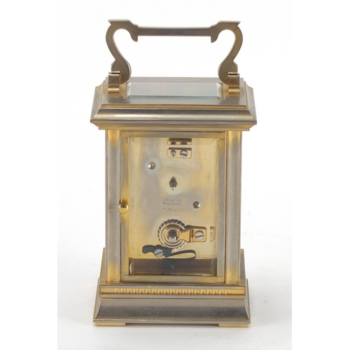 2357 - Morrell & Hilton brass cased carriage clock with enamelled dial and Roman numerals, 12cm high