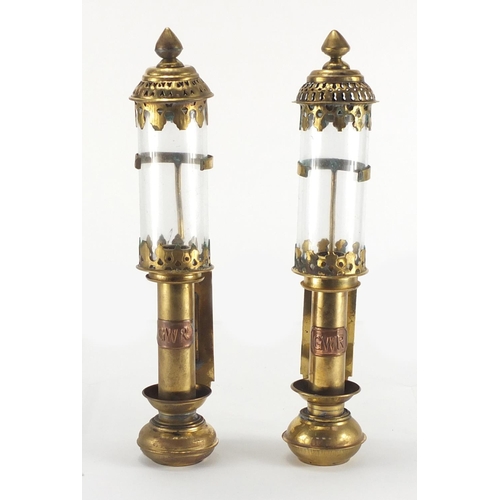 2287 - Pair of GWR brass candle holders with glass shades, each 35cm high