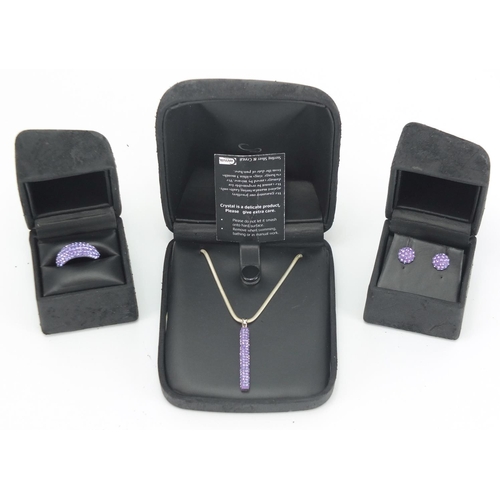 2828 - Silver and purple crystal jewellery suite comprising pendant on chain, ring and earrings