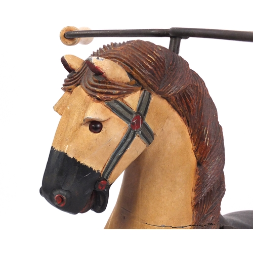 2121 - 19th century French carved wood and painted horse Velocipede, 103cm high