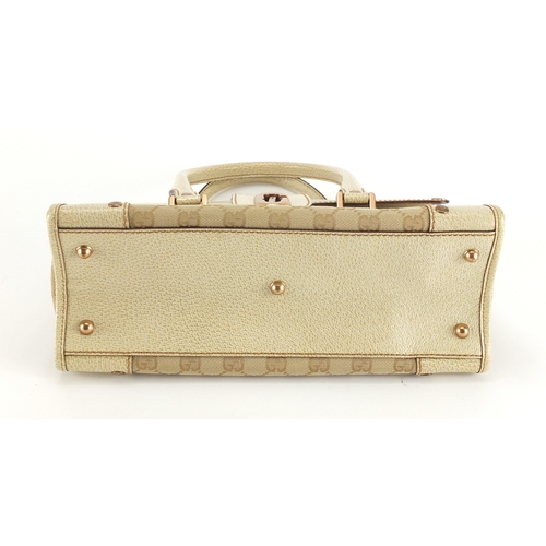 2246 - Gucci cream leather and monogrammed bag, 29cm wide