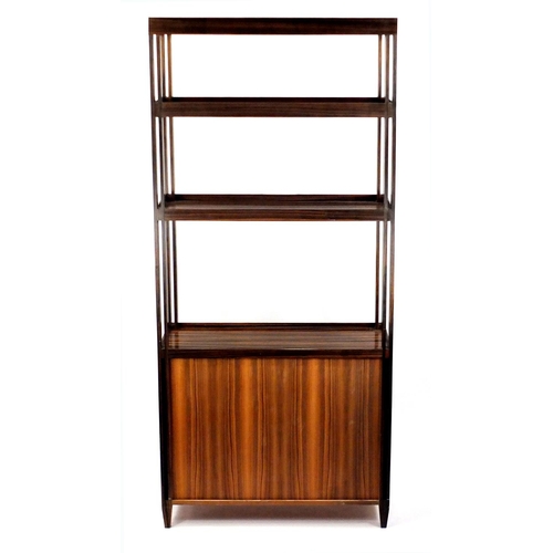 2117 - Madagascar ebony room divider, fitted with three galleried shelves above a pair of cupboard doors, e... 