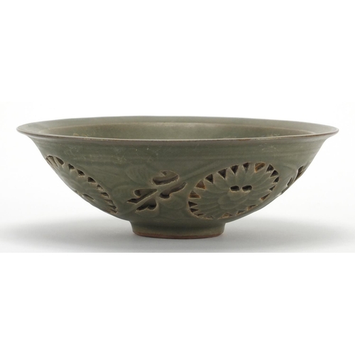 2197 - Chinese green glazed pottery bowl, pierced and decorated in low relief with phoenixes amongst clouds... 