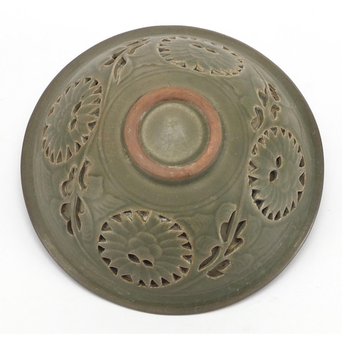 2197 - Chinese green glazed pottery bowl, pierced and decorated in low relief with phoenixes amongst clouds... 