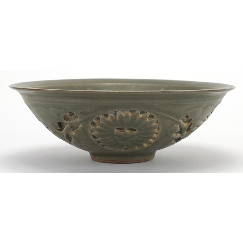 2197 - Chinese green glazed pottery bowl, pierced and decorated in low relief with phoenixes amongst clouds... 