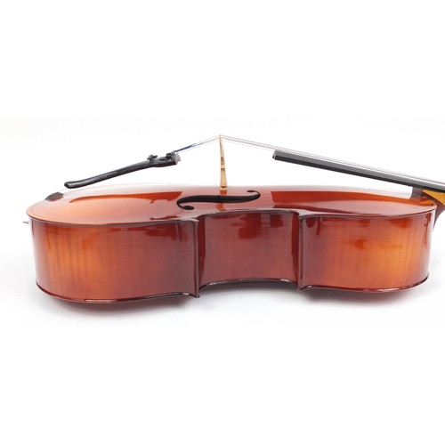 2235 - Czechoslovakian ¾ size cello with bow and protective case, the cello back 27.25 inches