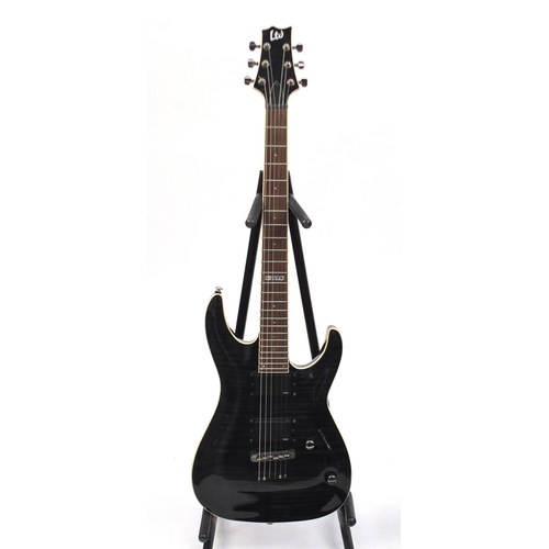 2231 - ESP six string electric guitar, with ECC Effects Command Center and a Roland amplifier, the guitar s... 