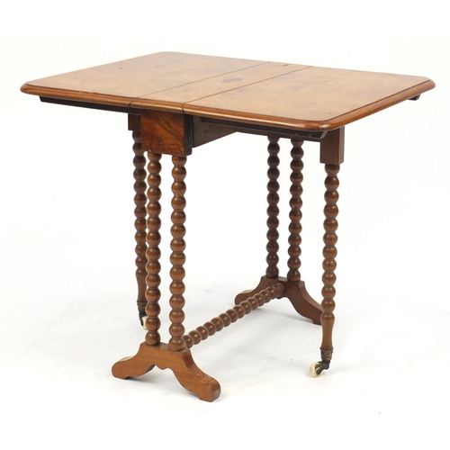 2022 - Victorian burr walnut Sutherland table, with bobbin turned supports and china castors, 53cm H x 50cm... 