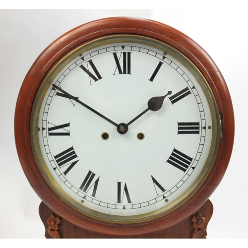 2076 - Drop dial wall clock with Roman numerals, carved with flowers, 59cm high