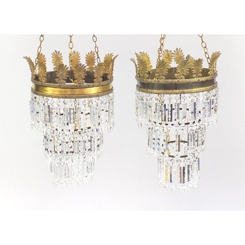 2172 - Pair of gilt brass three tier bag chandeliers, with cut glass drops, each 32cm in diameter