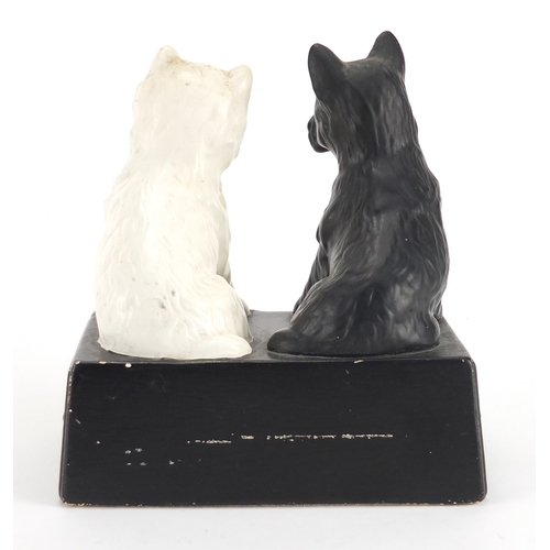 2324 - Vintage black and white Scotch whisky pottery advertising group of two terriers, impressed made in E... 