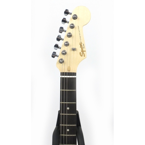 2233 - Squier Stratocaster by Fender six string electric guitar, serial number CMF18000158